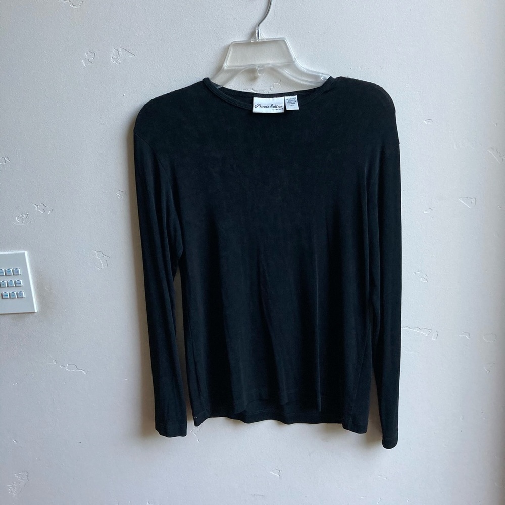 Chico’s travelers top, size one,